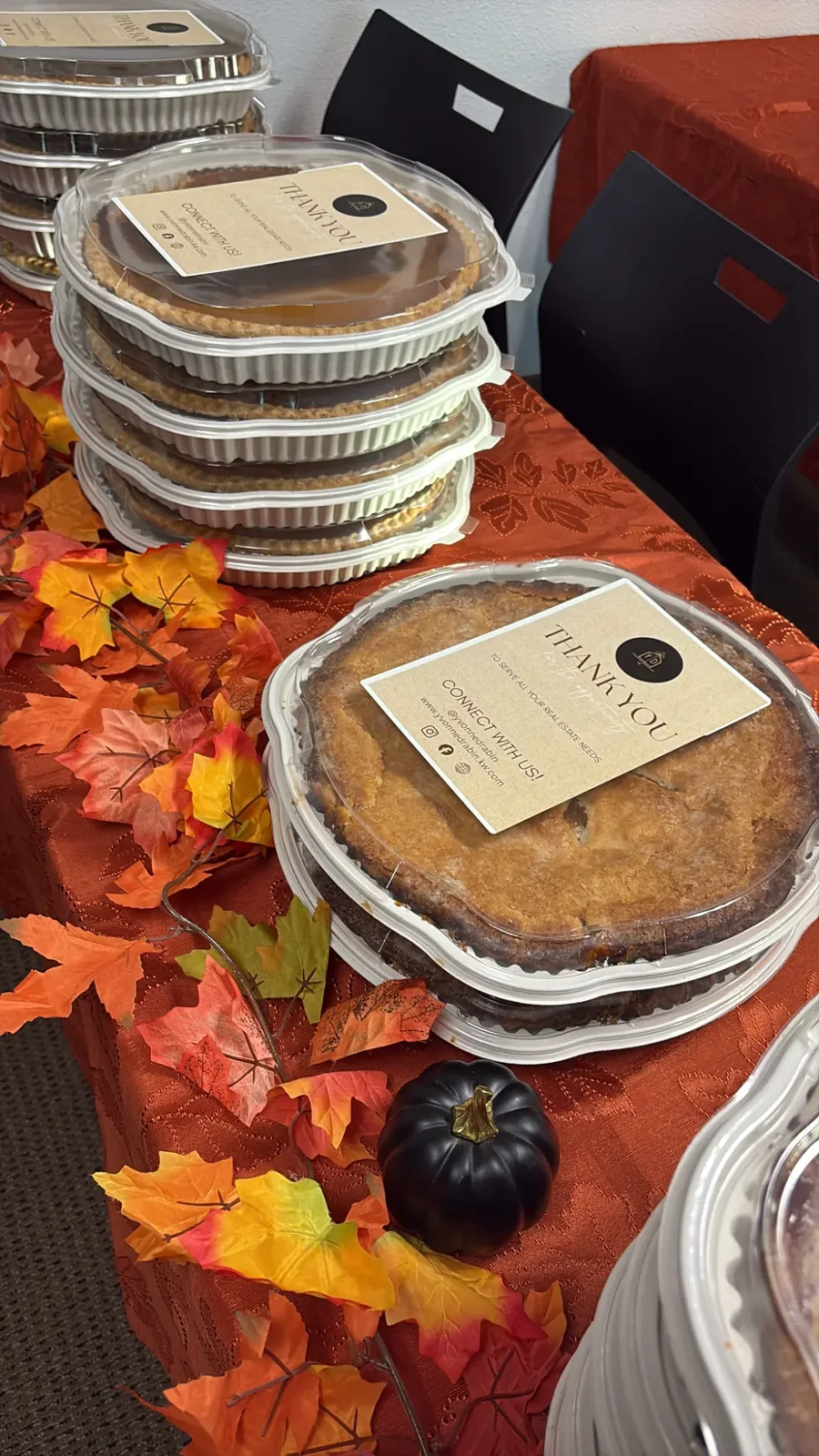 Stacked pies on a decorated table